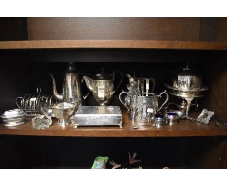 A selection of assorted plated ware including cigarette box, lighter, toast racks and coffee pots etc.