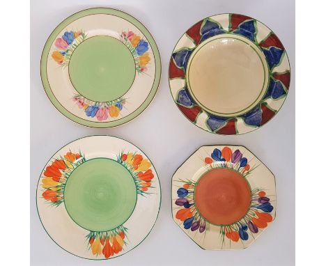A collection of Clarice Cliff, to include; A Clarice Cliff saucer in the Crocus pattern, hand painted in colours, printed fac