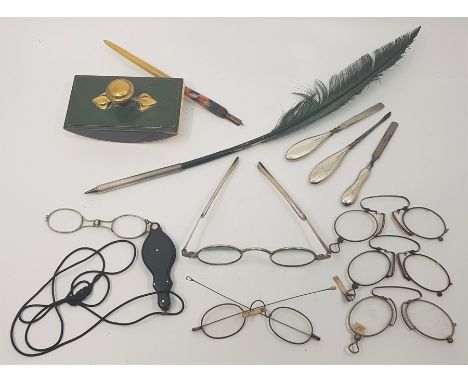 A collection of late 18th and 19th spectacles and lunnettes, to include: a pair of silver spectacles with hinged folding temp