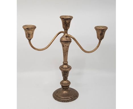 A Preisner (American) silver three branch candelabra,&nbsp;in three sections enabling use as either a single or dwarf stick, 