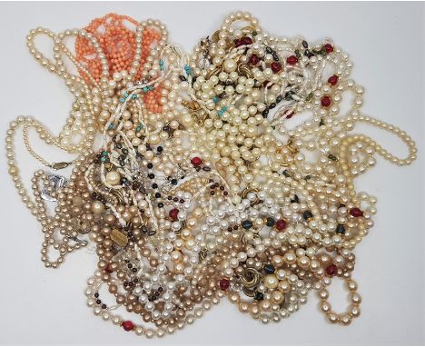 A large quantity of synthetic pearl and other necklaces. (qty)
