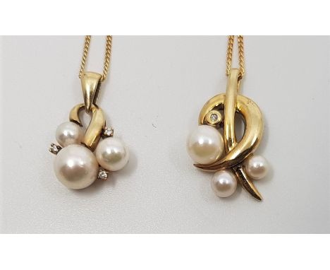 Two 9ct. gold pendants set graduated cultured pearls and diamond, each suspended from fine 9ct. gold flat curb link chain, to