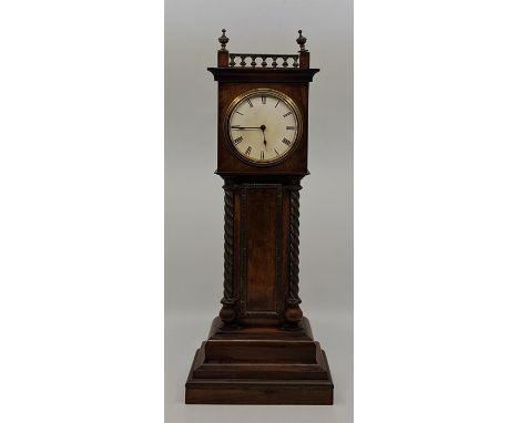 An early 20th century miniature walnut longcase clock, having white enamel Roman numeral dial,&nbsp;Buren movement (in workin