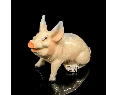 Pink and grey pig with black hoof detailing. Hand painted item. Glazed finished. Beswick England backstamp. Dimensions: 4.75"