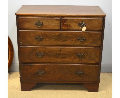 A Georgian mahogany chest, canted rectangular fitted two short and three long graduated drawers, bracket feet (restored), 96 