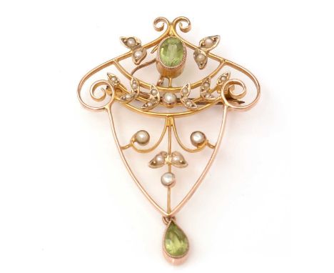 An Edwardian peridot and seed pearl brooch/pendant, the scrolling frame stamped '9ct' to reverse, 4.2g gross.