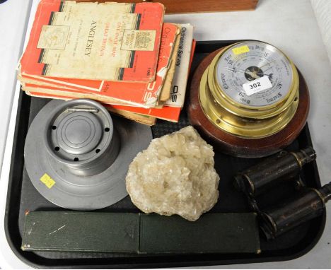 A selection of scientific instruments and other explorer's ephemera, including: a pair of Ross, London, binoculars; a wall mo
