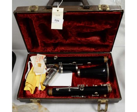 An Evette B flat clarinet by Buffet Crampon, in fitted carry case.