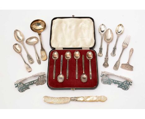 A selection of silver items, including: a silver bladed butter knife by George Unite; a pair of knife rests, by PS, Sheffield