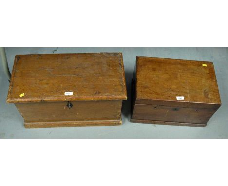 A selection of wood working tools, including: chisels, saw, and other items, contained across two vintage mahogany tool boxes