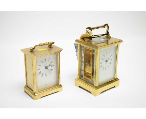 A 20th Century Angelus brass-cased carriage clock, 16.5cms high including handle; together with an Estyma quartz brass-cased 