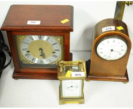 A 19th Century glass cased carriage clock; together with a Harrison &amp; Son Darlington miniature domed cased mantle clock; 