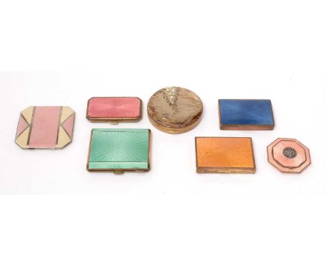 A selection of guilloche enamel compacts, on metal bases; and two others. 