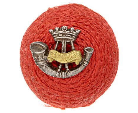 Canada. Princess Patricias Light Infantry Officer red cord boss bearing silver and gilt badge.  Badge being gilt bugle strung