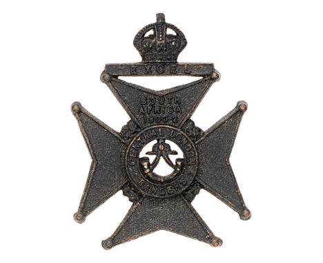 22nd Middlesex, Central London Rangers cap badge circa 1905-08 only.  Scarce die-stamped blackened brass crowned EXCEL tablet