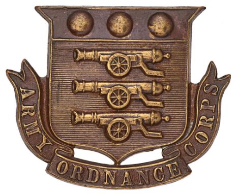 Army Ordnance Corps Victorian cap badge.  Good large die-stamped shield bearing Ordnance Arms resting on title scroll.    Ton