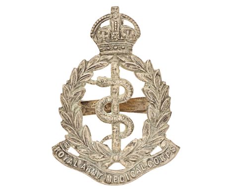 Royal Army Medical Corps Volunteers Edwardian Officer cap badge circa 1901-08..  Good scarce die-cast silvered crowned laurel