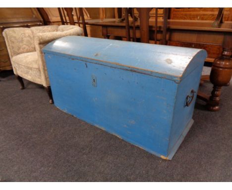 An antique painted dome topped shipping trunk. 