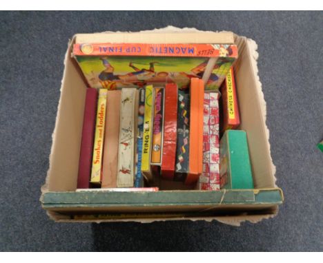 A box containing vintage board games to include Magnetic Cup Final, Pixie Derby, etc. 
