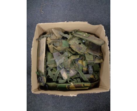A box of army surplus webbing and pouches