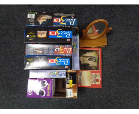 A box containing 3D Jigsaw puzzles, ceramic hair dryer, Stonecraft building kit, dressing table mirror. 