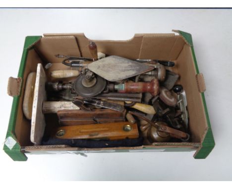 A box containing a large quantity of vintage hand tools, oil can, wooden woodworking plane etc. 