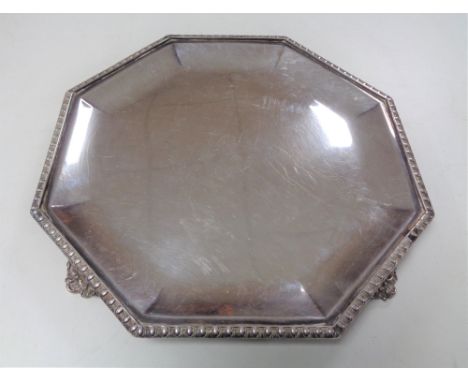 A George V silver octagonal salver on raised feet, 813g, George Howson, Sheffield 1935