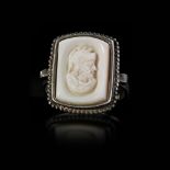 A (PROBABLY) SILVER RING WITH A CARVED CAMEO