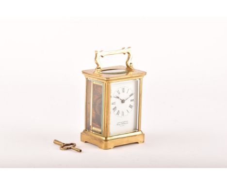 A 20th century carriage clock, the white Roman numeral dial signed Thurlow Champness, Bury St Edmunds, K Paris, height 10.7cm