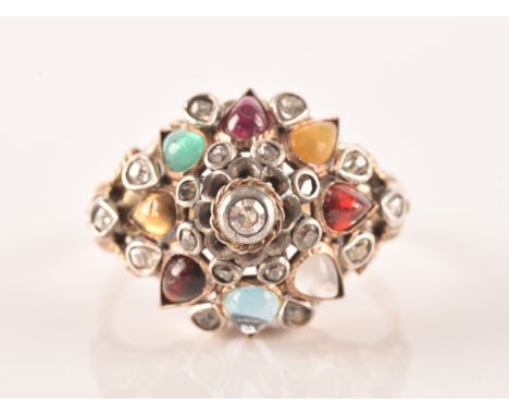 A yellow metal, diamond, and multi-gem princess ring, of domed design, set with garnet, tigers eye, moonstone, garnet, and su