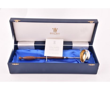 A Silver Jubilee toddy ladle with 1897 shilling inset in the bowl, limited edition of 500, by The Royal Mint, length 30 cm, i