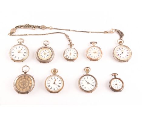 A collection of eight ladies antique silver fob watches, most with white enamel dials and black Roman numerals, one with gold