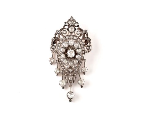 A Victorian diamond brooch/pendant, set to centre with a cushion shape old mine diamond with an approximate diamond weight of