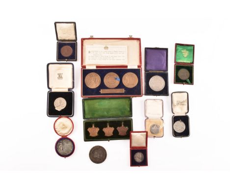 A collection of Commemorative Coronation silver, silvered and bronze medals, a cased triple bronze medal set of the Three Bri