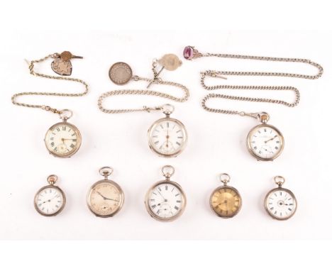 A collection of eight antique silver pocket watches, all with white enamel dials and black Roman or Arabic numerals, three wi