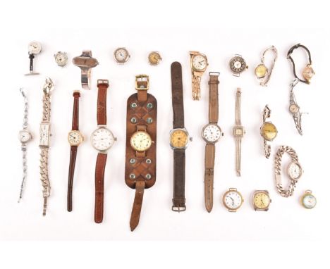 A collection of ladies wrist watches including a small 9ct gold ladies watch, a collection of assorted silver watches, WWI wr