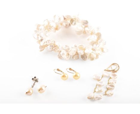 A group of pearl jewellery, including a pair of 9ct yellow gold and keshi pearl drop earrings, along with a matching elastica