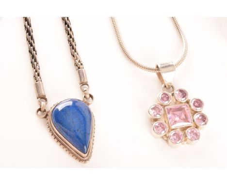 Two silver necklaces, one set with pink stones, the other set with a blue cabochon stone, together with a silver bangle set w