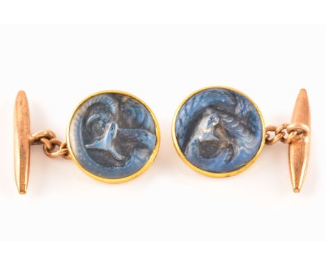 René Lalique (French, 1860-1945) A pair of Serpent cufflinks, Marcilhac number 1300 designed in 1912 clear and frosted glass 