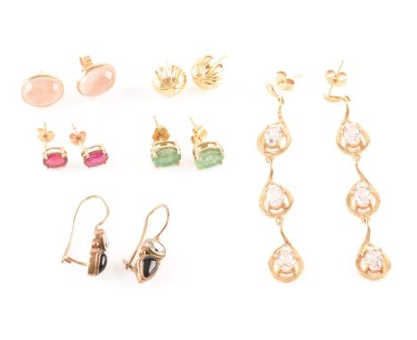 A group of 9ct yellow gold earrings set with various stones, including a pair of dangle earrings and three pairs of studs ear