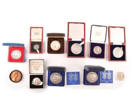 Queen Elizabeth II and Prince Philip. Two cased silver Royal Anniversary Medals, a silver boxed Coronation medal, a Two Royal