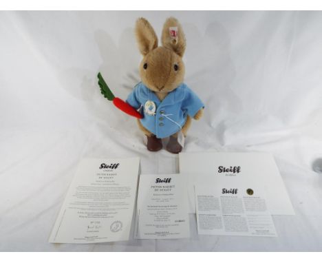 Steiff - A limited edition Steiff Peter Rabbit with certificate 1700 of 5000, button in ear, white tag, approximately 31 cm (