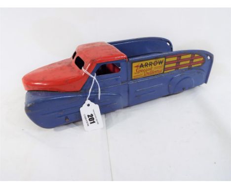 An American tin-plate model truck marked 'Arrow Special Delivery', 32 cm (length)  - Est £30 - £50  This lot MUST be paid for