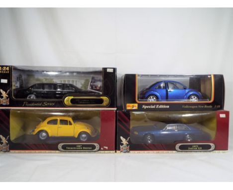 Maisto and Road Signature - four boxed diecast vehicles 1:18 scale comprising a VW Beetle, a Cadillac Deville, a Jaguar XJS a