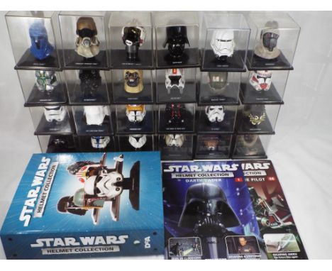 Deagostini - 24 Star Wars helmets in original plastic boxes 1:5 scale, to include Darth Vader and Luke Skywalker and similar,