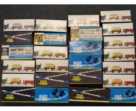 Model Railways - Twenty five boxed wagons in HO scale made by Piko Modellbahn, these wagons were made in the German Democrati