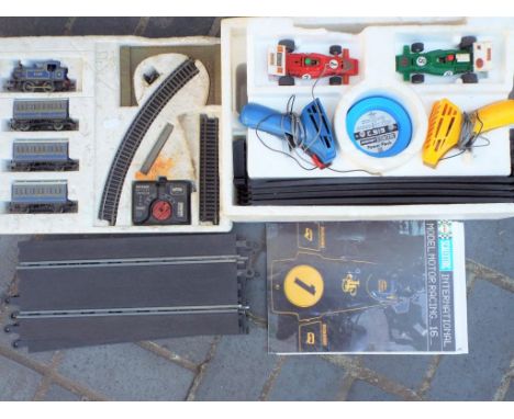 A good lot to contain a Scalextric set ref C547, comprising two BRM Racing Cars, controllers, transformer and track, no outer