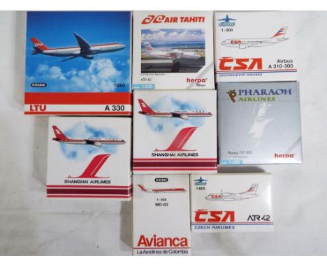 Model Aircraft - eight diecast models of commercial airlines by Herpa and Schabak in 1:500 and 1:600 scale, models appear min