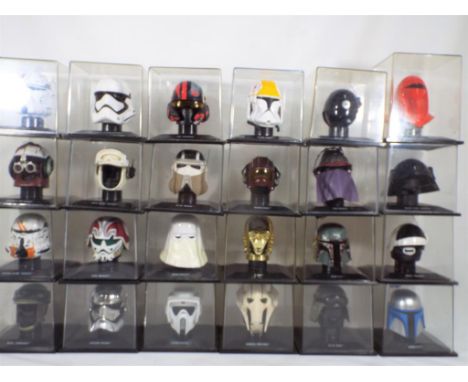 Deagostini - 24 Star Wars helmets in original plastic cases 1:5 scale, includes C3PO, Storm Troopers and others, cases very g