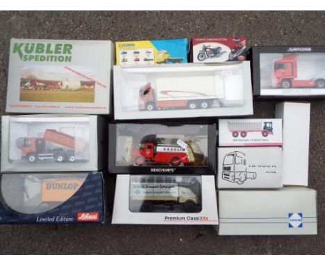 A collection of diecast scale models comprising two Minichamps # 439 070192 and # 439 350070, Kubler Spedition by Conrad # 40